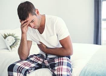 Man with stomach problems from Actiq withdrawal